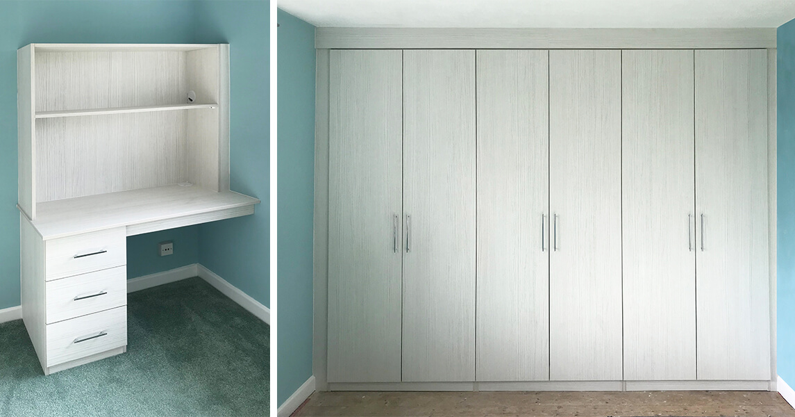 Fitted wardrobes with a matching desk and bookcase in a white oak finish and chrome handles.